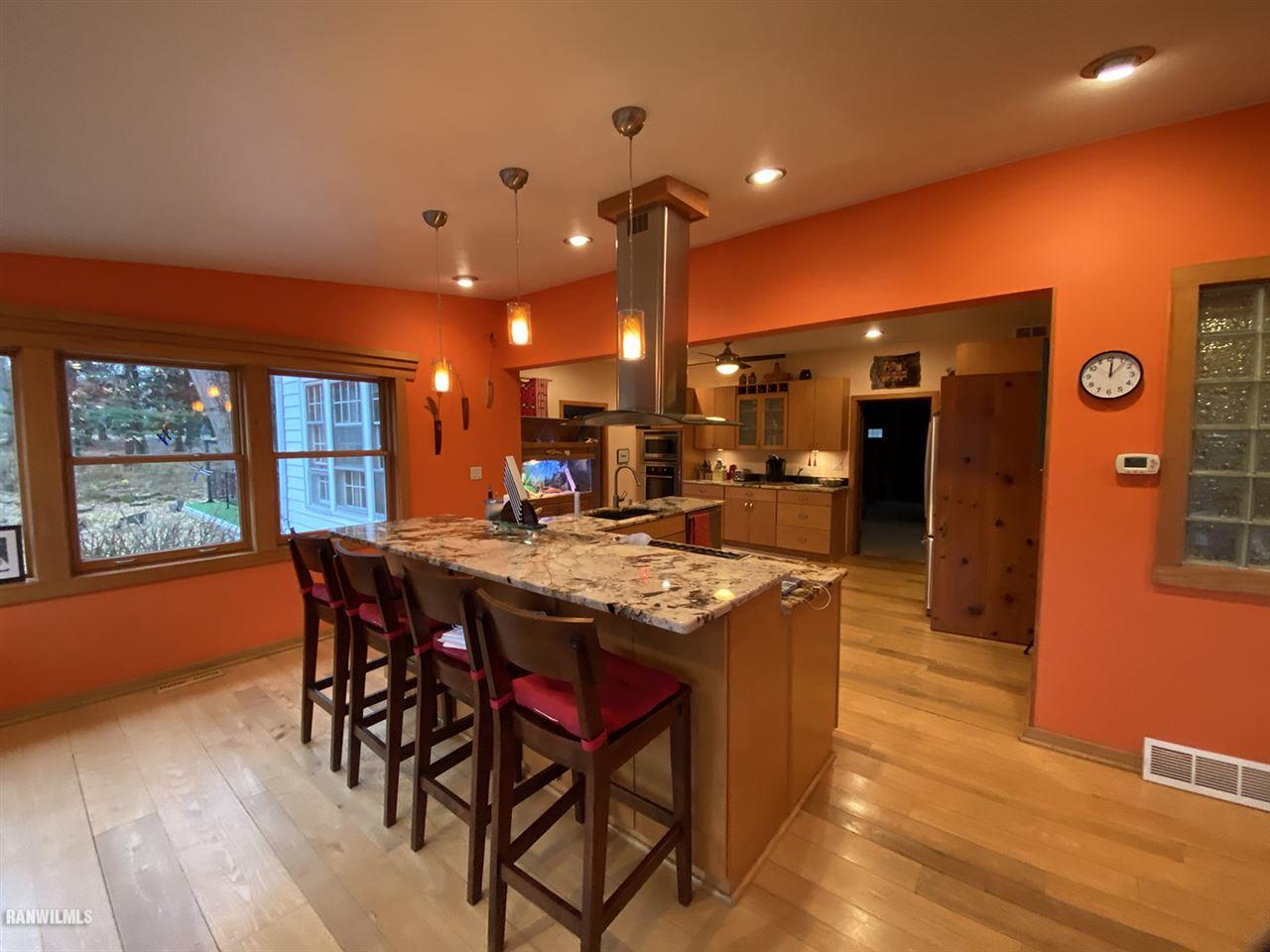 2871 West Forest Road Freeport, IL 61032 - Photo 34 of 68 a kitchen with a table and chairs in it