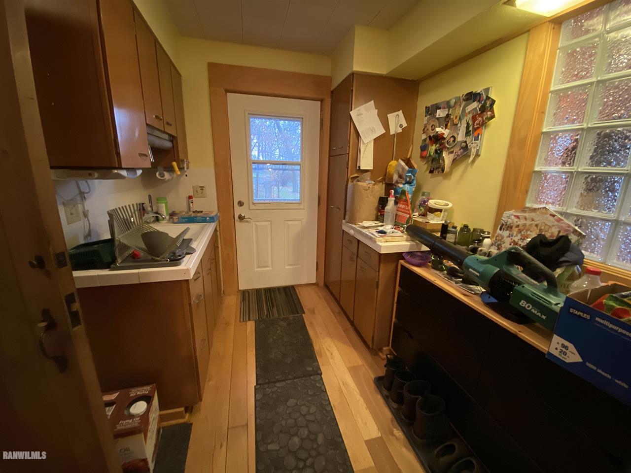 2871 West Forest Road Freeport, IL 61032 - Photo 38 of 68 a kitchen with a sink and cabinets
