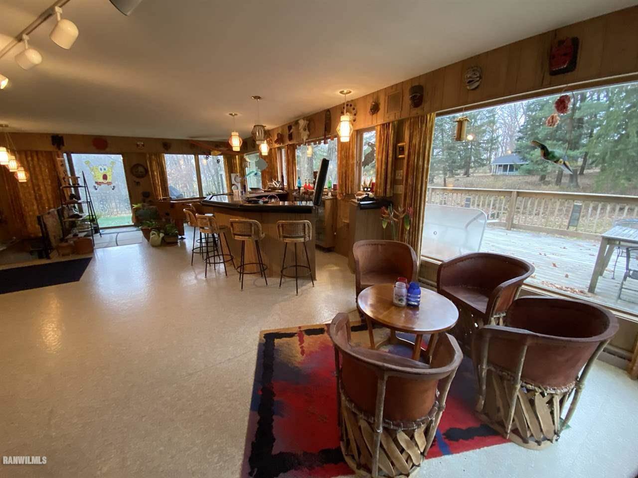 2871 West Forest Road Freeport, IL 61032 - Photo 40 of 68 a dining room with furniture and wooden floor