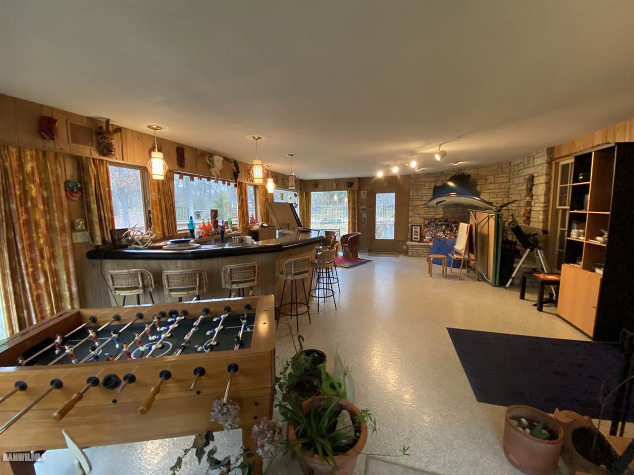 2871 West Forest Road Freeport, IL 61032 - Photo 41 of 68 a living room with furniture and a flat screen tv