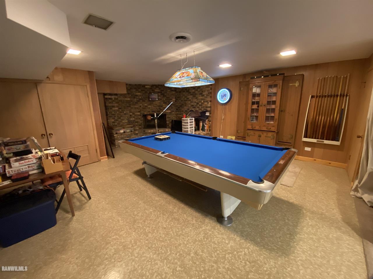 2871 West Forest Road Freeport, IL 61032 - Photo 43 of 68 a room with gym equipment and a flat screen tv