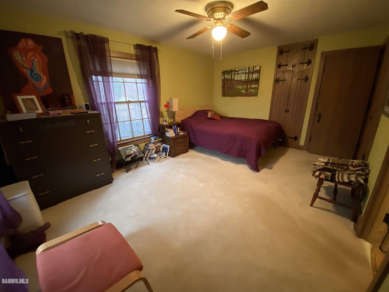 2871 West Forest Road Freeport, IL 61032 - Photo 45 of 68 a bed room with a bed and a television