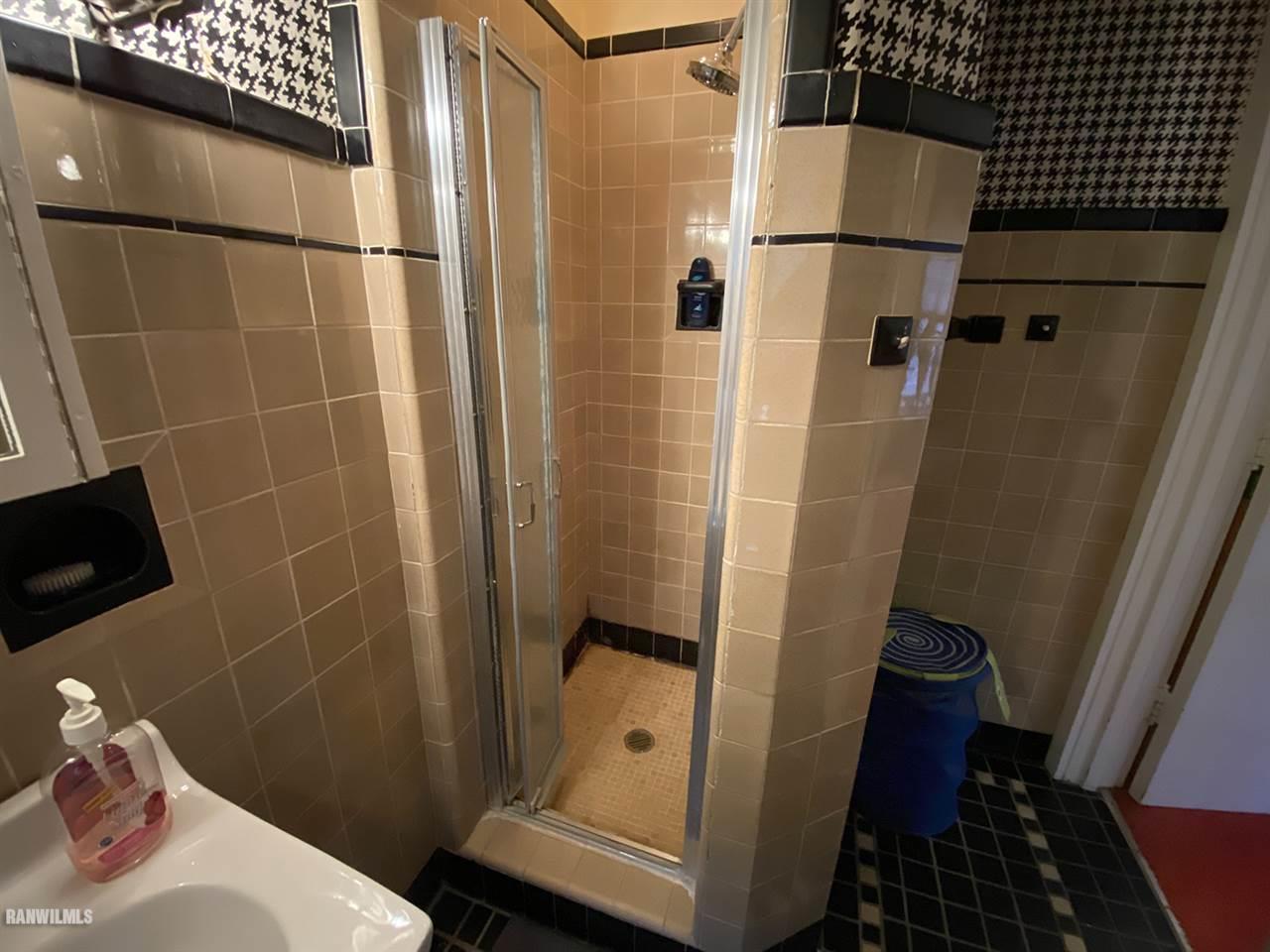 2871 West Forest Road Freeport, IL 61032 - Photo 53 of 68 a bathroom with a sink and shower