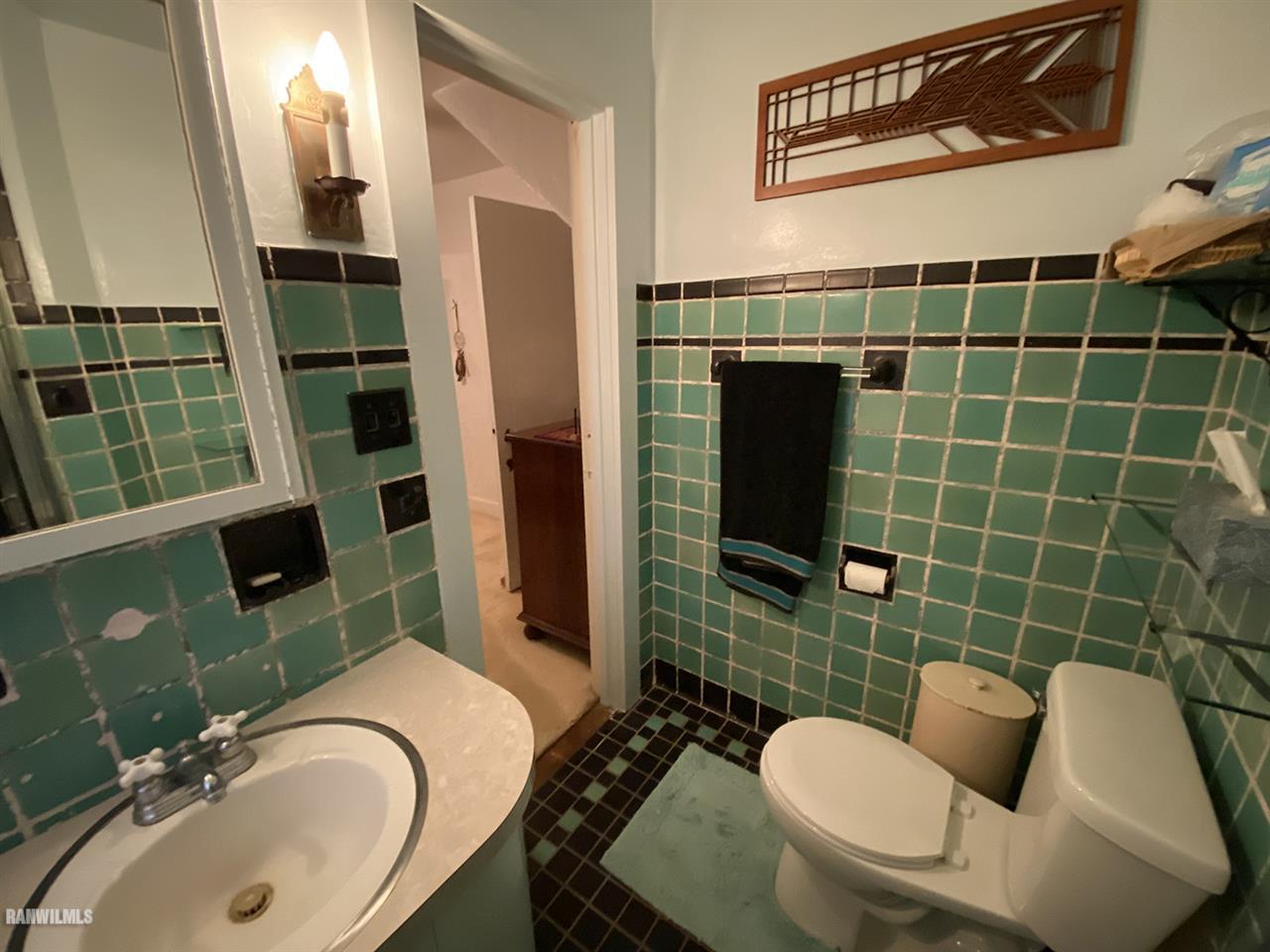 2871 West Forest Road Freeport, IL 61032 - Photo 63 of 68 a bathroom with a sink toilet and shower