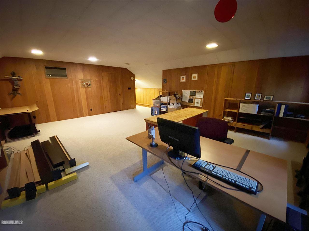 2871 West Forest Road Freeport, IL 61032 - Photo 68 of 68 a living room with furniture and a flat screen tv