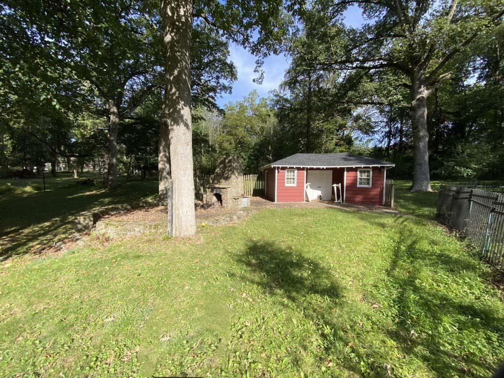 2871 West Forest Road Freeport, IL 61032 - Photo 10 of 68 a front view of a house with garden