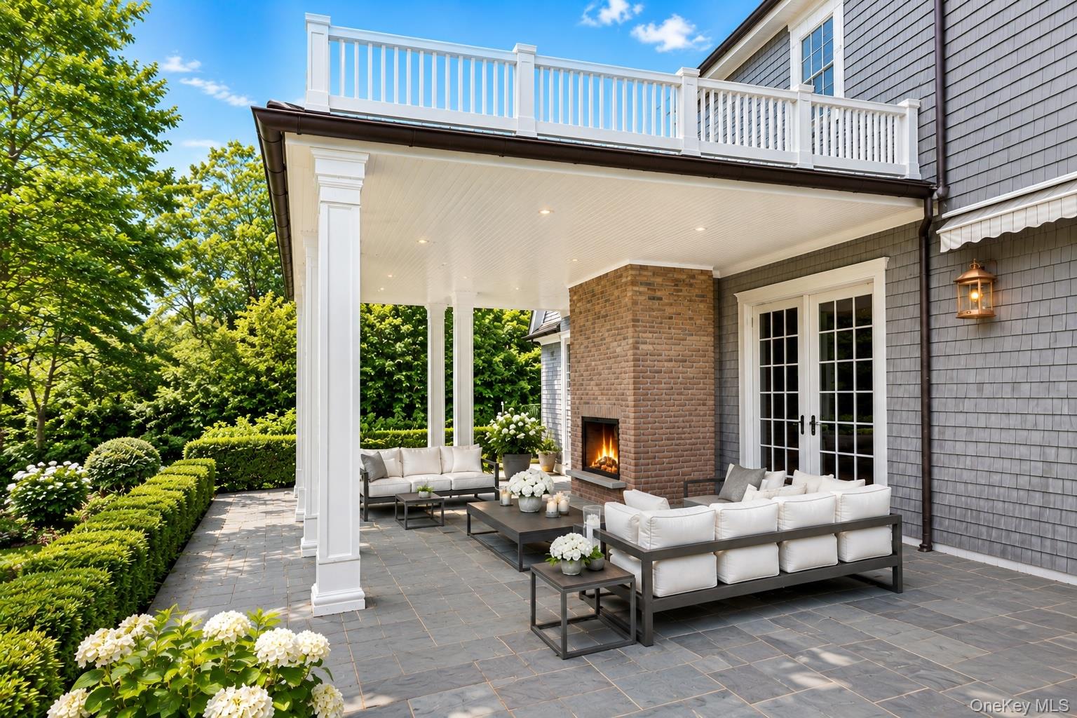 486 Middle Line Highway Bridgehampton, NY 11976 - Photo 24 of 28 a balcony with furniture and a potted plant