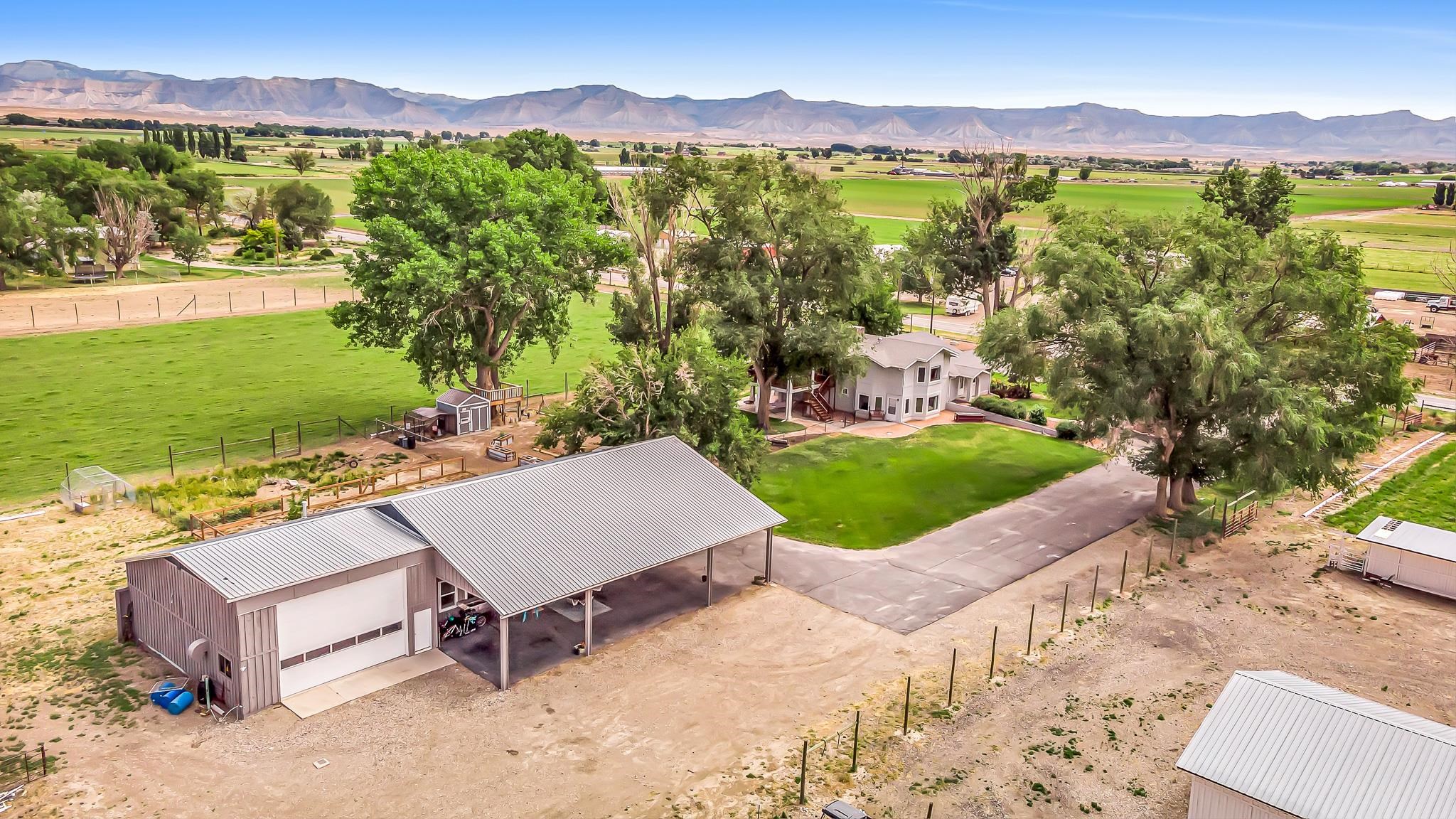 1171 20 Road Fruita, CO 81521 - Photo 22 of 42 a view of a patio with a mountain yard