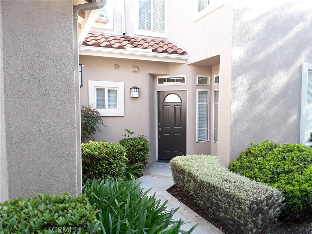 2345 Tryall Tustin, CA 92782 - Photo 2 of 29 a front view of a house with garden