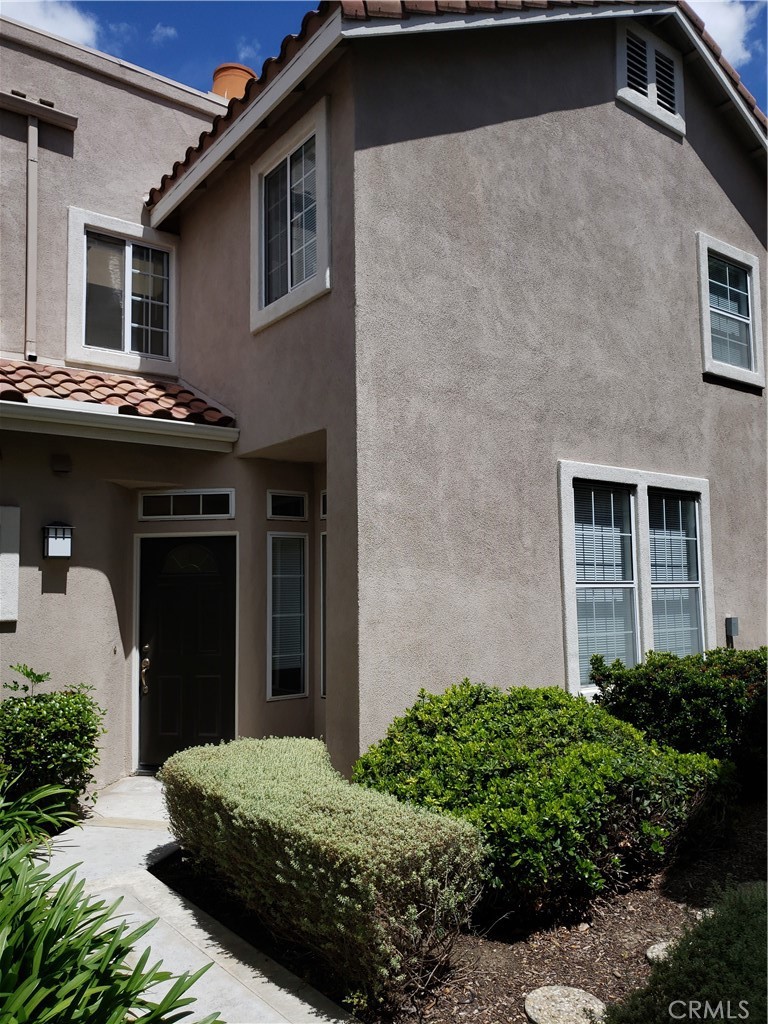 2345 Tryall Tustin, CA 92782 - Photo 22 of 29 a view of a house with a garage