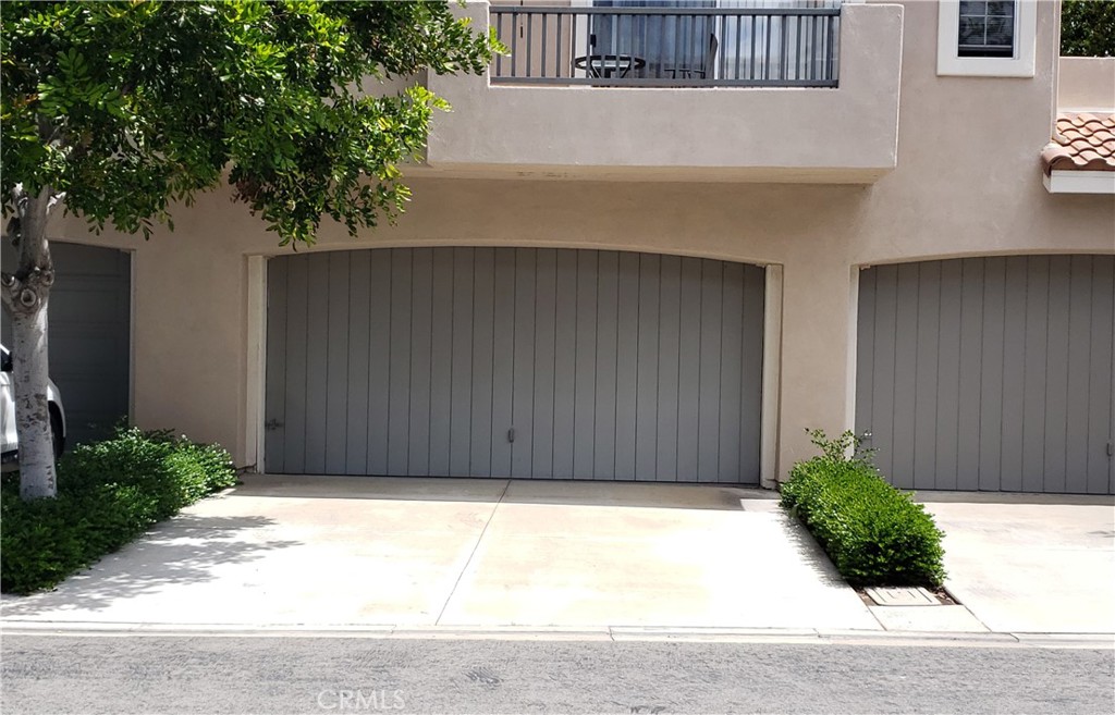 2345 Tryall Tustin, CA 92782 - Photo 23 of 29 a view of a house with a backyard