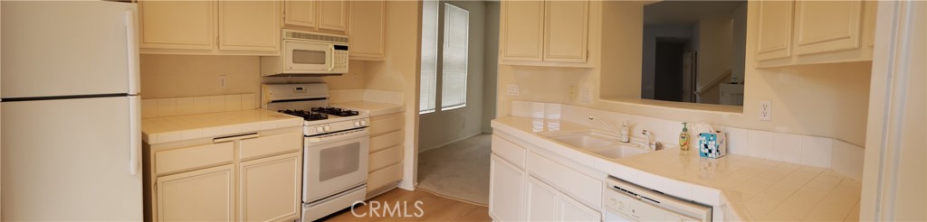 2345 Tryall Tustin, CA 92782 - Photo 8 of 29 a bathroom with a shower and a sink