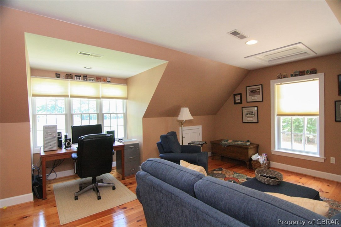 98 Flood Point Road Heathsville, VA 22473 - Photo 39 of 44 Abundance of windows throughout this house. Always happy and cheerful space.