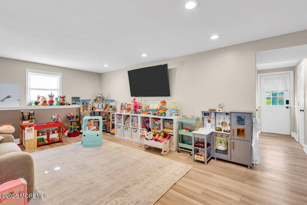 37 Glenbrook Road Freehold, NJ 07728 - Photo 12 of 34 a room with lots of furniture and clutter