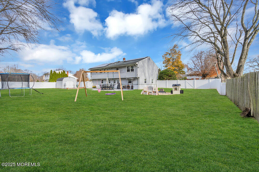 37 Glenbrook Road Freehold, NJ 07728 - Photo 31 of 34 a view of a house with a big yard