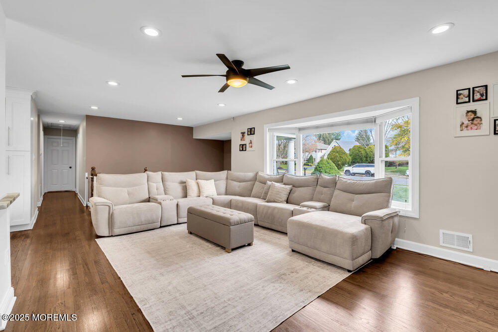 37 Glenbrook Road Freehold, NJ 07728 - Photo 4 of 34 a living room with furniture and a large window