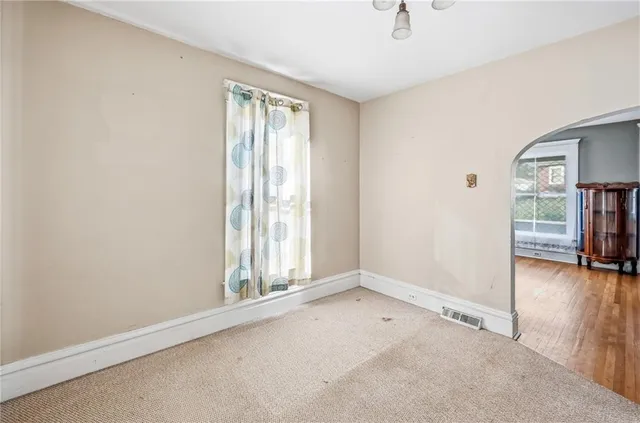 an empty room with window