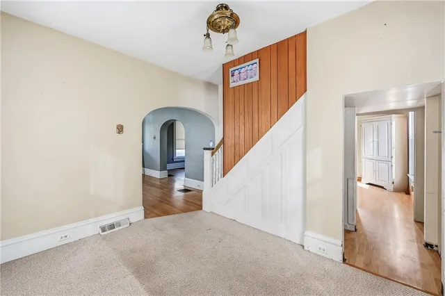 a view of a hallway view with staircase