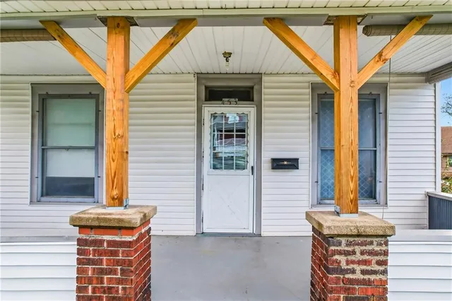 a front view of a house with street