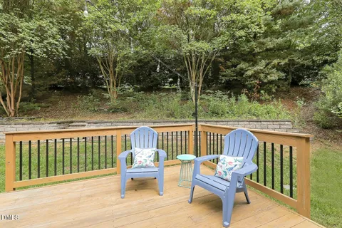 a view of a two chairs in the deck