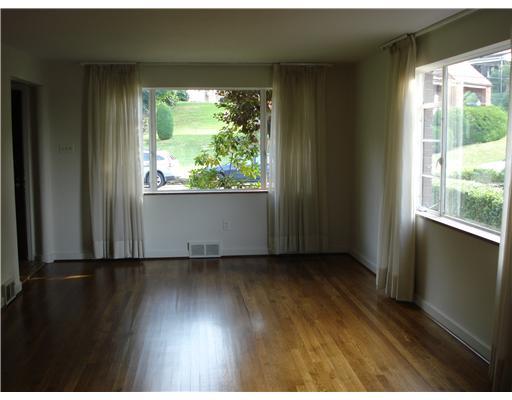 2827 Fernwald Road Pittsburgh, PA 15217 - Photo 2 of 12 Living Room. Spacious living room with two large windows.
