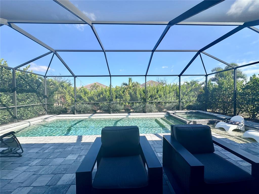 2716 Butterfly Jasmine Trail Sarasota, FL 34240 - Photo 12 of 27 a view of an outdoor sitting space