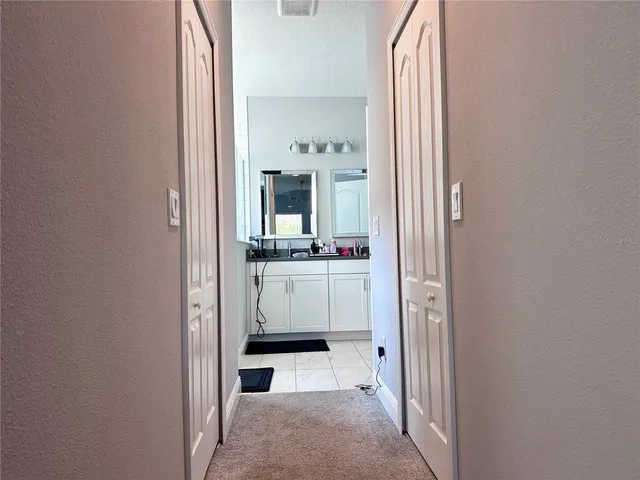 a bathroom with sink and mirror
