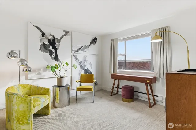 a living room with furniture and a window