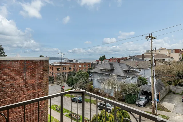 a view of a balcony with an ocean view