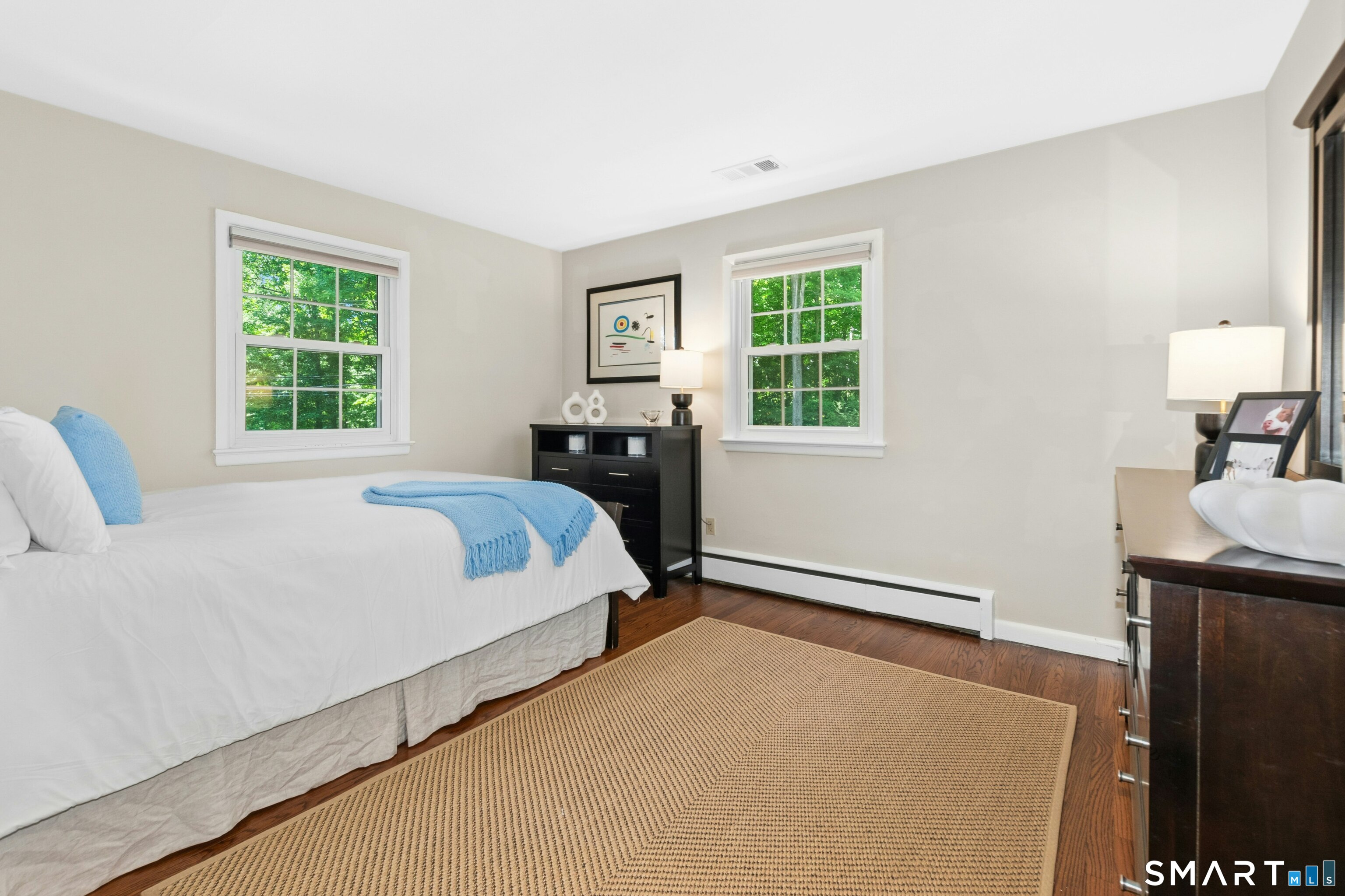 29 Old Farm Road Weston, CT 06883 - Photo 18 of 27 This bedroom is very generously sized. Like the rest of the home it offers warm hardwood floors, and is impeccable.