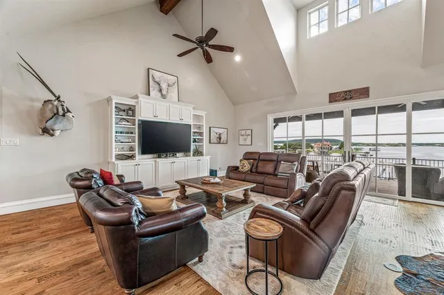 a kitchen with stainless steel appliances granite countertop a sink and stove top oven