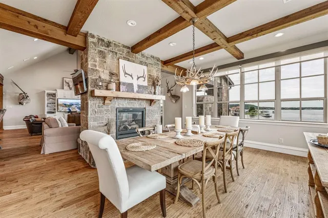 a kitchen with refrigerator and cabinets