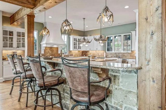 a living room with furniture and flat screen tv