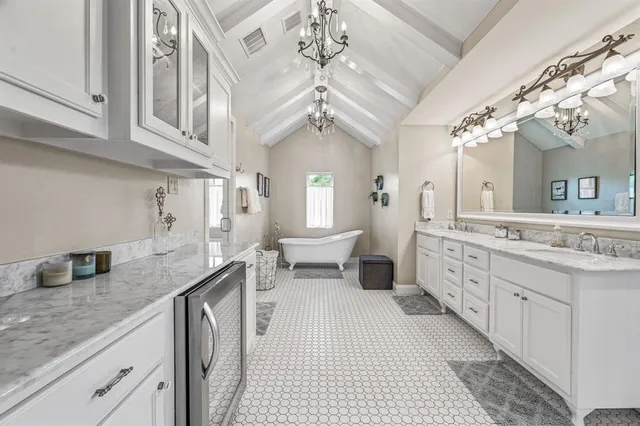 a view of a lake with houses in the back