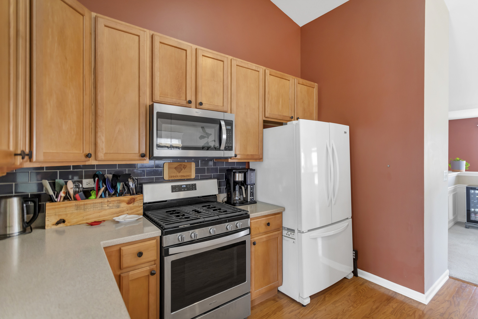 2574 Golf Ridge Circle Naperville, IL 60563 - Photo 14 of 29 a kitchen with a refrigerator stove and microwave