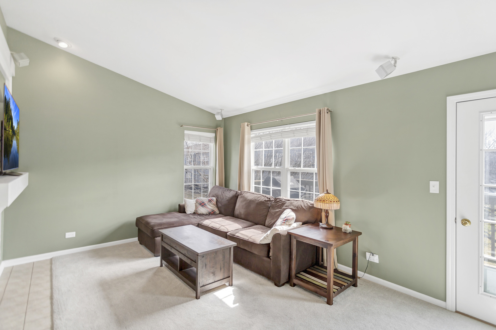 2574 Golf Ridge Circle Naperville, IL 60563 - Photo 18 of 29 a living room with furniture and a window