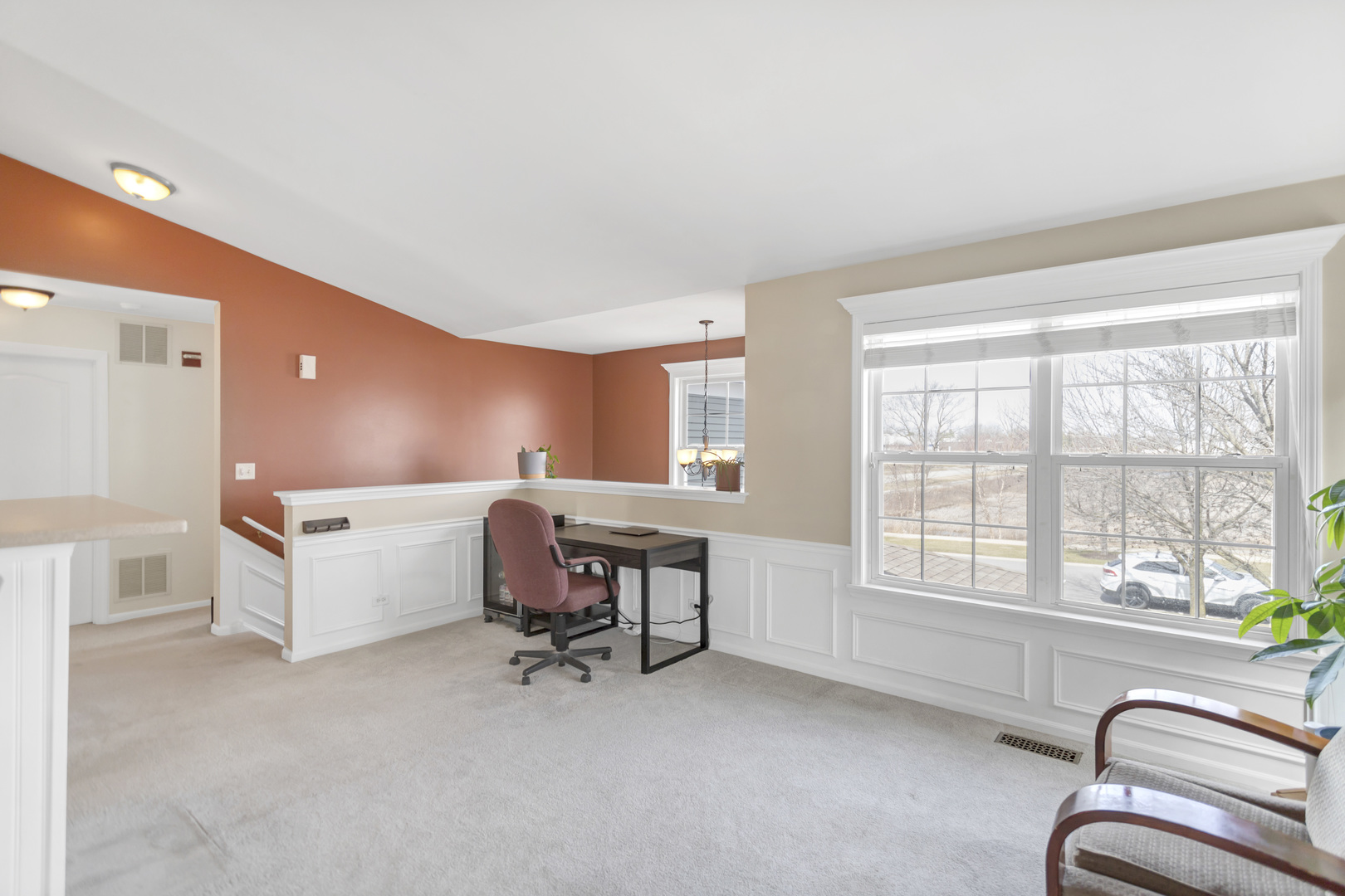 2574 Golf Ridge Circle Naperville, IL 60563 - Photo 9 of 29 a living room with furniture and a window