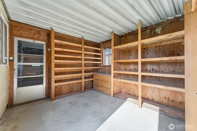 front view of house next to a yard