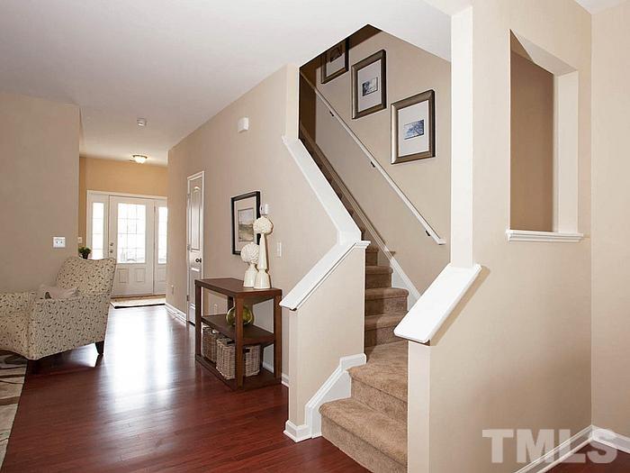1020 Grand Ridge Drive Rolesville, NC 27571 - Photo 11 of 23 a view of entryway and hall with wooden floor