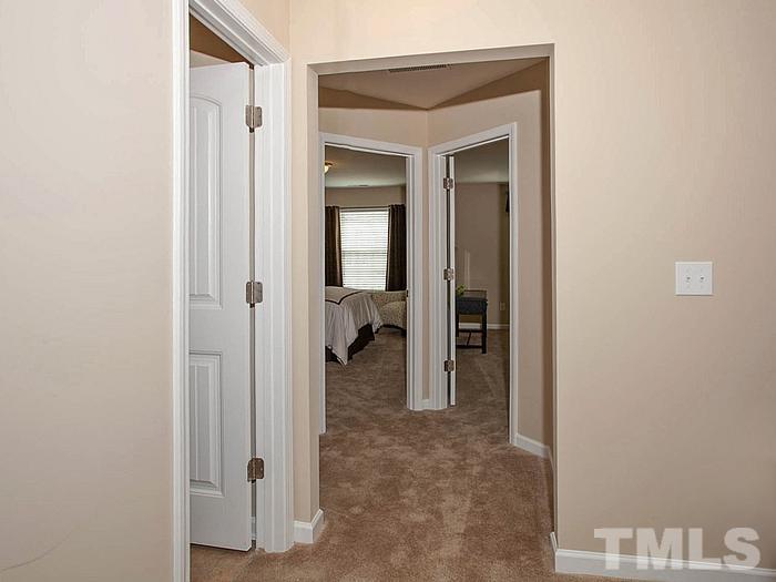 1020 Grand Ridge Drive Rolesville, NC 27571 - Photo 12 of 23 a view of a bathroom from a hallway