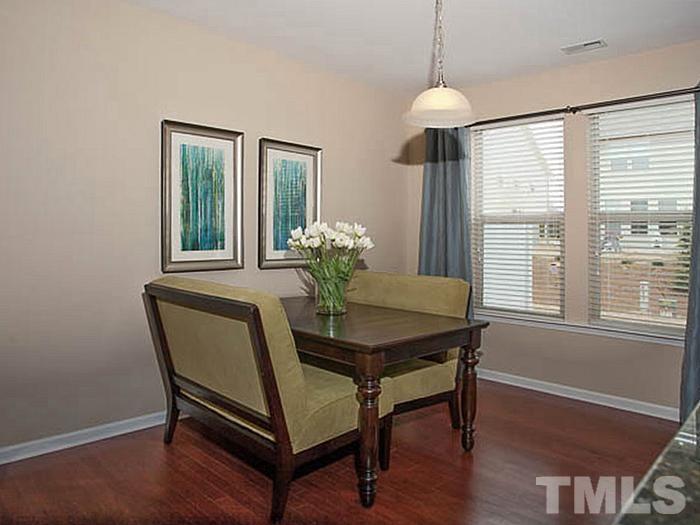 1020 Grand Ridge Drive Rolesville, NC 27571 - Photo 10 of 23 a dining room with furniture and window