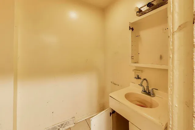 a bathroom with a sink and a tub