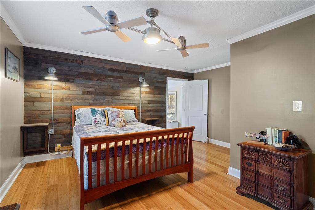 297 Tucker Hollow Road Southeast Calhoun, GA 30701 - Photo 16 of 42 a bedroom with furniture and a window