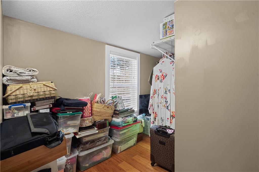 297 Tucker Hollow Road Southeast Calhoun, GA 30701 - Photo 22 of 42 a view of a workspace with furniture and a window