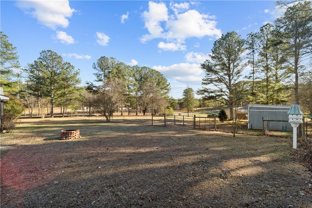 297 Tucker Hollow Road Southeast Calhoun, GA 30701 - Photo 31 of 42 a view of road with large trees