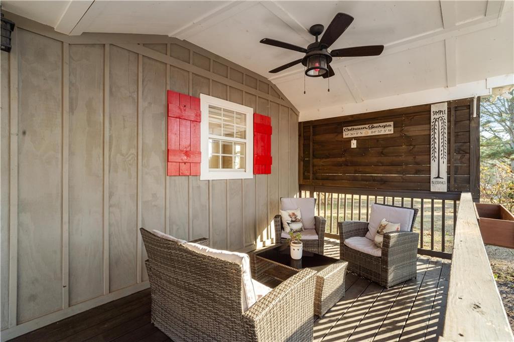 297 Tucker Hollow Road Southeast Calhoun, GA 30701 - Photo 5 of 42 a living room with furniture and a window