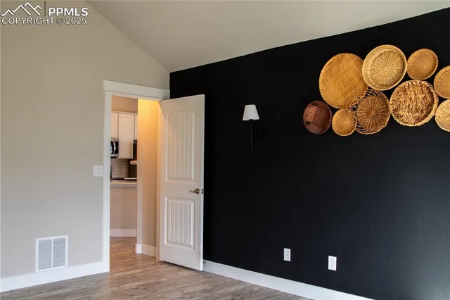 a bathroom with a sink and a bathtub next to a window