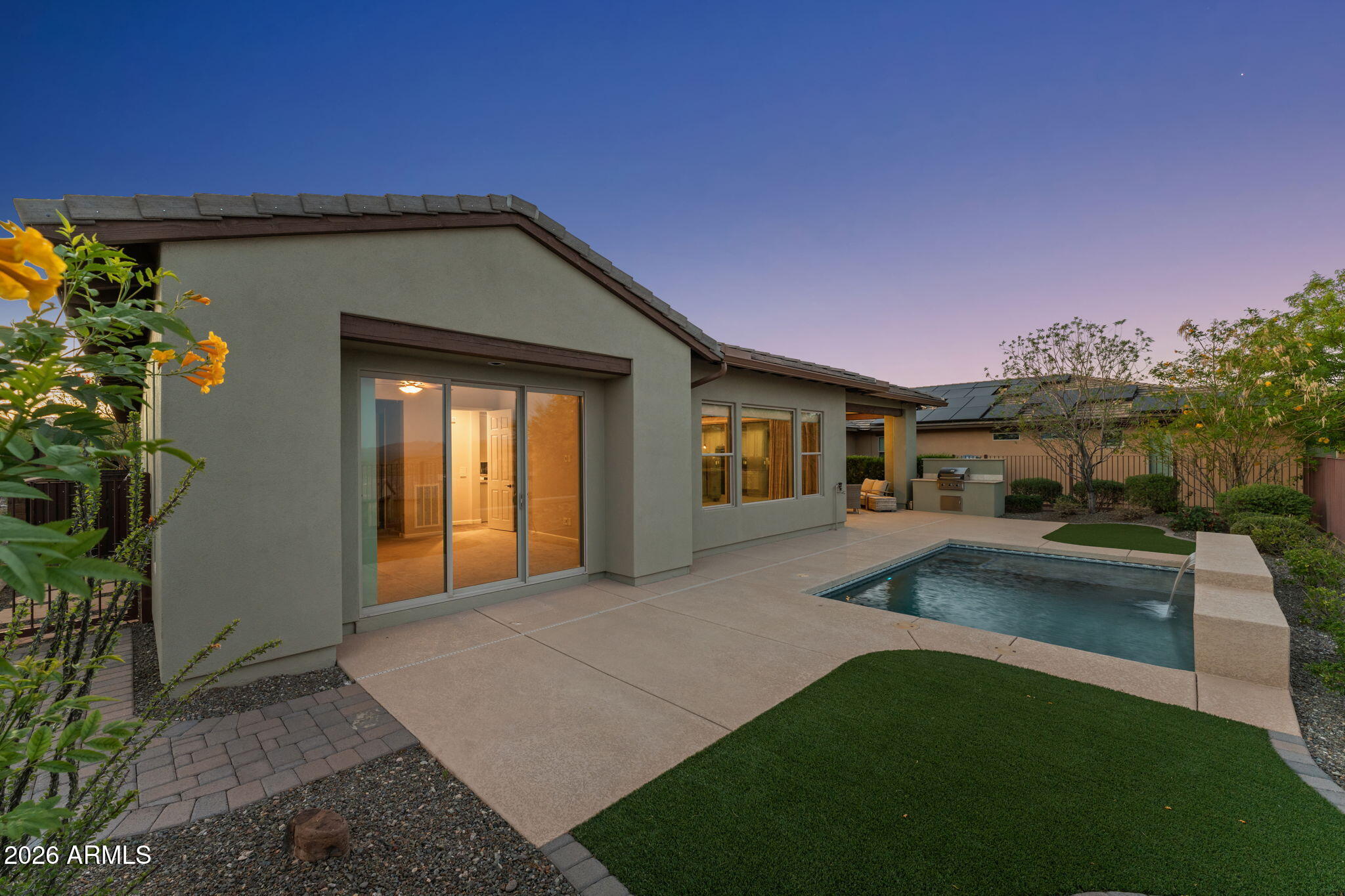 3675 Gold Ridge Road Wickenburg, AZ 85390 - Photo 43 of 58 a view of a house with backyard and porch