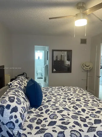 a bedroom with furniture and a bed