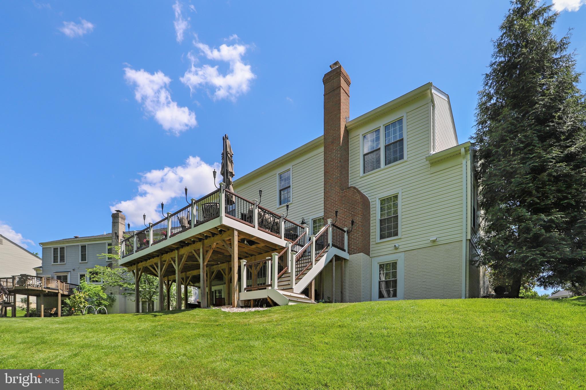 2908 Pleasant Glen Drive Oak Hill, VA 20171 - Photo 62 of 69 Rear TREX Deck with Stairs Down to Backyard